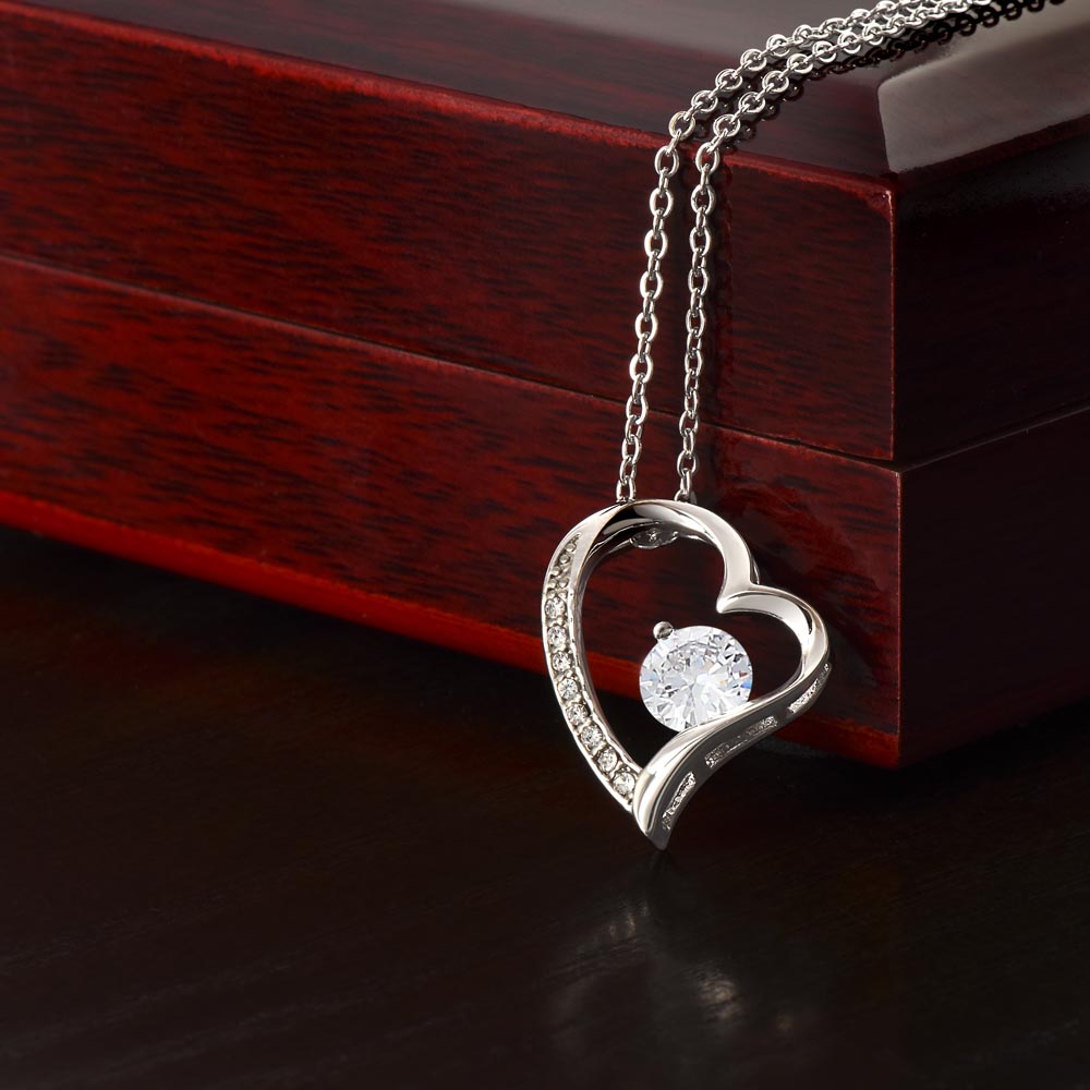 Show her that your love is forever with this polished heart pendant, she will love it