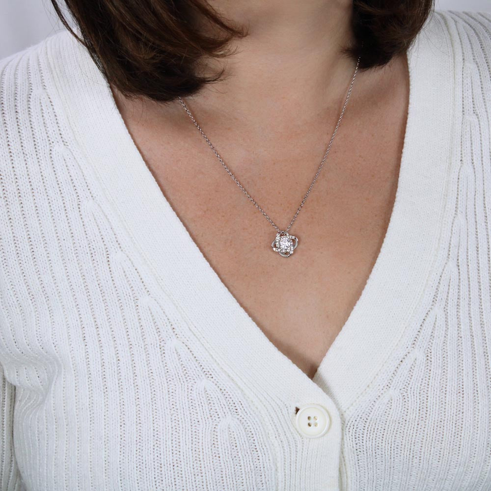 Your Mom is a special part of your life, show her how special with this beautiful Love Knot Necklace.